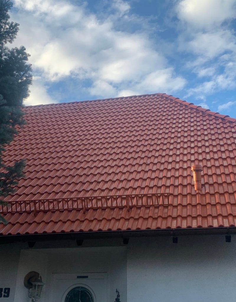 NEUEINDECKUNG EINES EINFAMILIENHAUSES